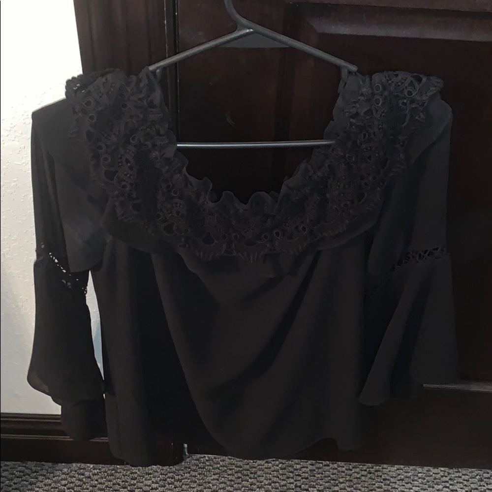 Black ruffled off the shoulder shirt
